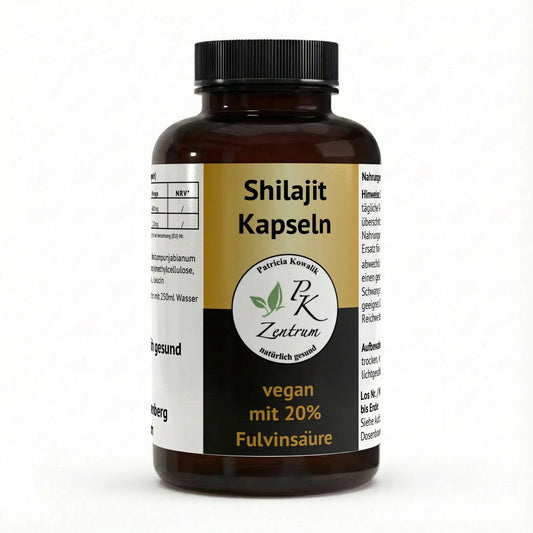 Frontansicht der Shilajit Kapseln Dose in Braunglas mit schwarzem Deckel. Das gold-schwarze Etikett zeigt das Logo "PK Zentrum natürlich gesund", den Produktnamen "Shilajit Kapseln" und die Highlights: "vegan", "mit 20% Fulvinsäure".